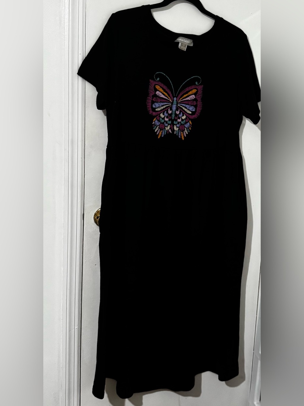 Woman Within Black Maxi Dress with Multicolor Butterfly Embroidery